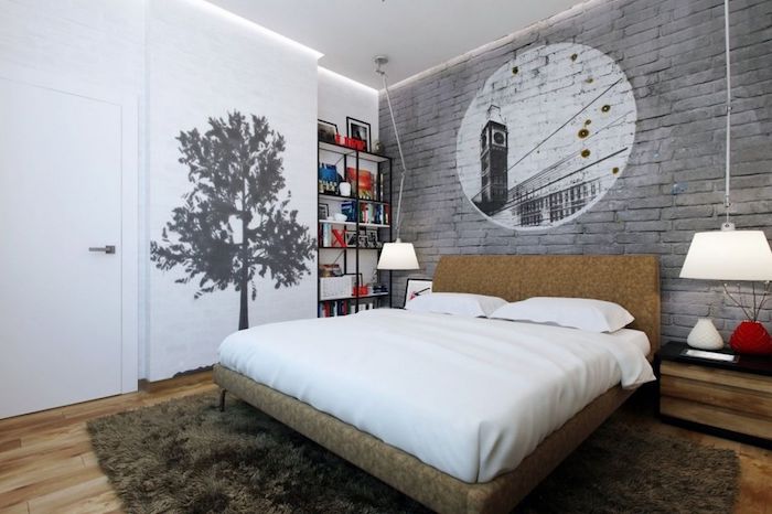 tree mural in black, on a white wall, and an image of big ben, in a white circle on a gray brick wall, wall decor ideas, inside a double bed bedroom