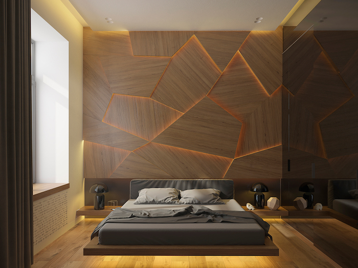bedroom wall decor, asymmetrical wooden shapes, lit from behind, decorating one wall of a room, with modern furniture and bed