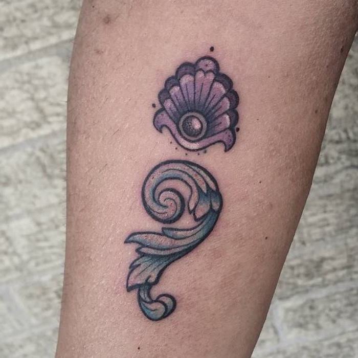 wave in blue, and clam with pearl in purple, with thick black outlines, positioned so as to form a semicolon, tattooed on a leg, semicolon tattoo meaning