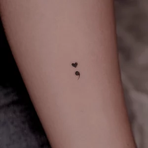 tiny heart semicolon tattoo