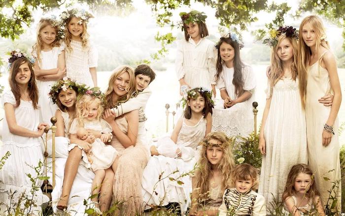 boho clothes in white, worn by fourteen kids of different ages, posing with kate moss, casual dress code, maxi dresses and drummer boy uniforms