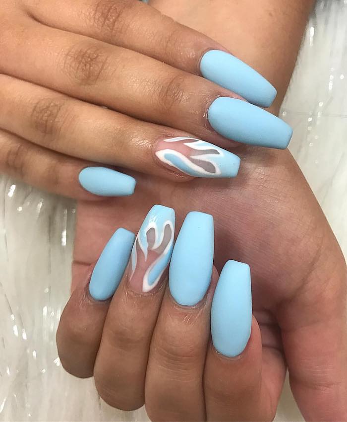 baby blue matte nail polish, on the long nails of two hands, coffin nail designs, each ring finger nail is decorated with a clear, and white asymmetric motif