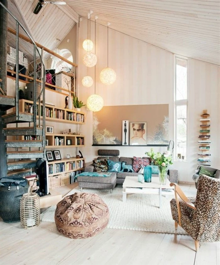 animal print armchair, and a grey corner sofa, inside a loft studio, home decor inspiration, pale beige walls, and a cream laminate floor