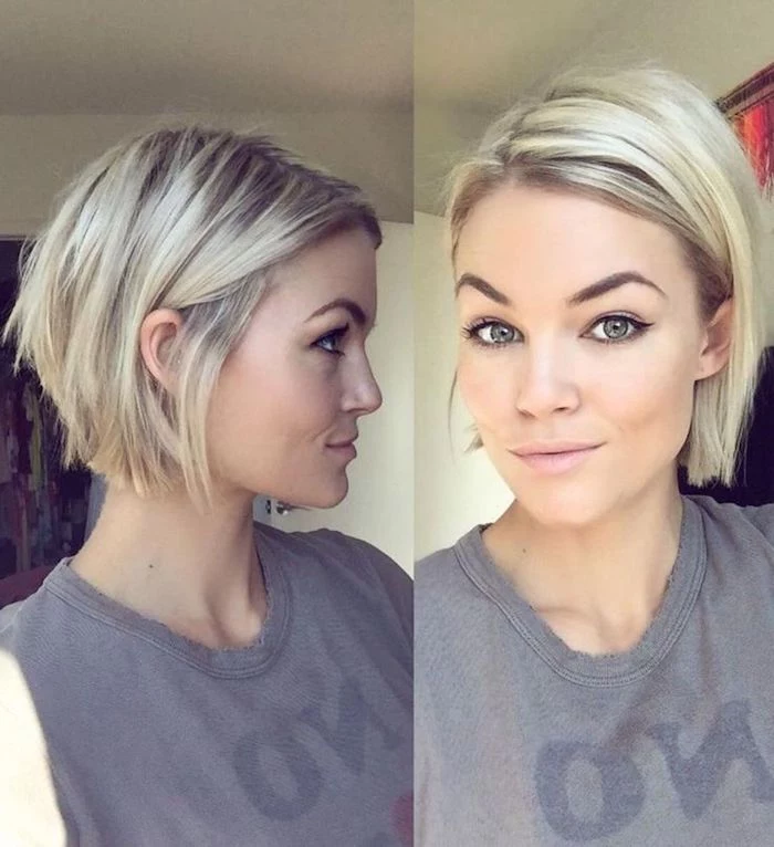 tucked behind the ear, short sassy haircuts, smiling young woman, with platinum blonde hair, and dark roots, wearing a grey t-shirt