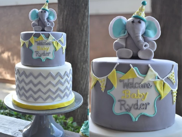party hat on a small elephant figurine, made from grey and blue fondant, topping a grey cake, elephant baby shower cake, decorated with yellow details, and tiny fondant flags