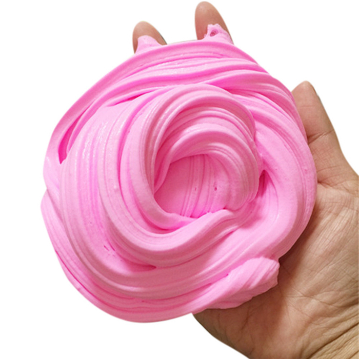 bubblegum pink piece of twisted goo, soft and foamy, how to make fluffy slime, held by a pale hand, on a pure white background