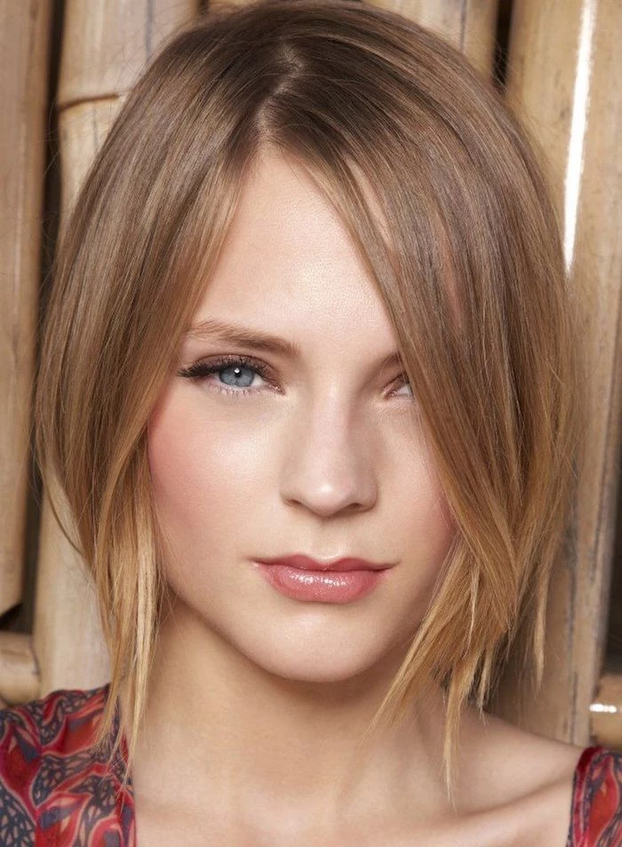 close up of a young woman, with sooth and straight honey blonde hair, wearing glossy lipstick, short hairstyles for fine hair 