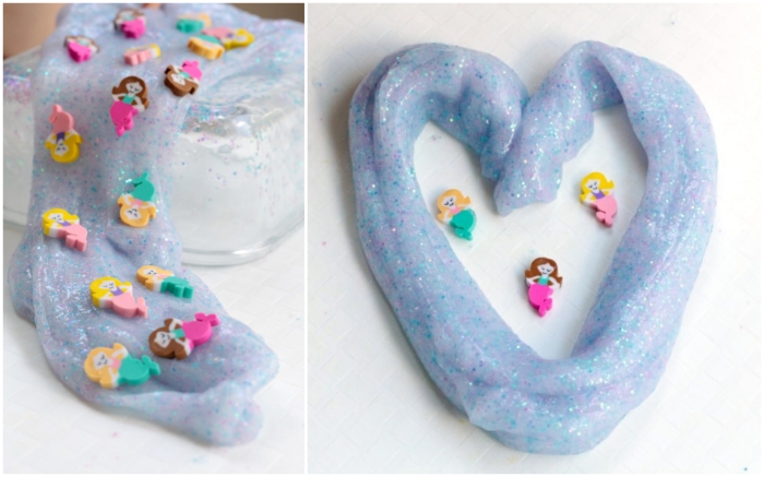 mermaid goop in light blue, with fine pink and blue glitter, elmer's glue slime, decorated with tiny mermaid-shaped figurines, made from colorful foam