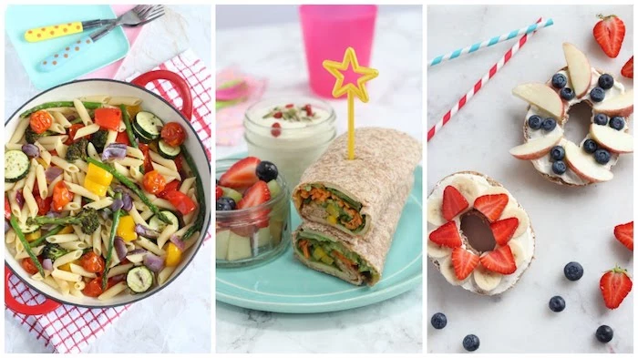 wraps with vegetables, bagels with cream cheese, strawberries and bananas, apples and blueberries, and a pan of pasta with vegetables