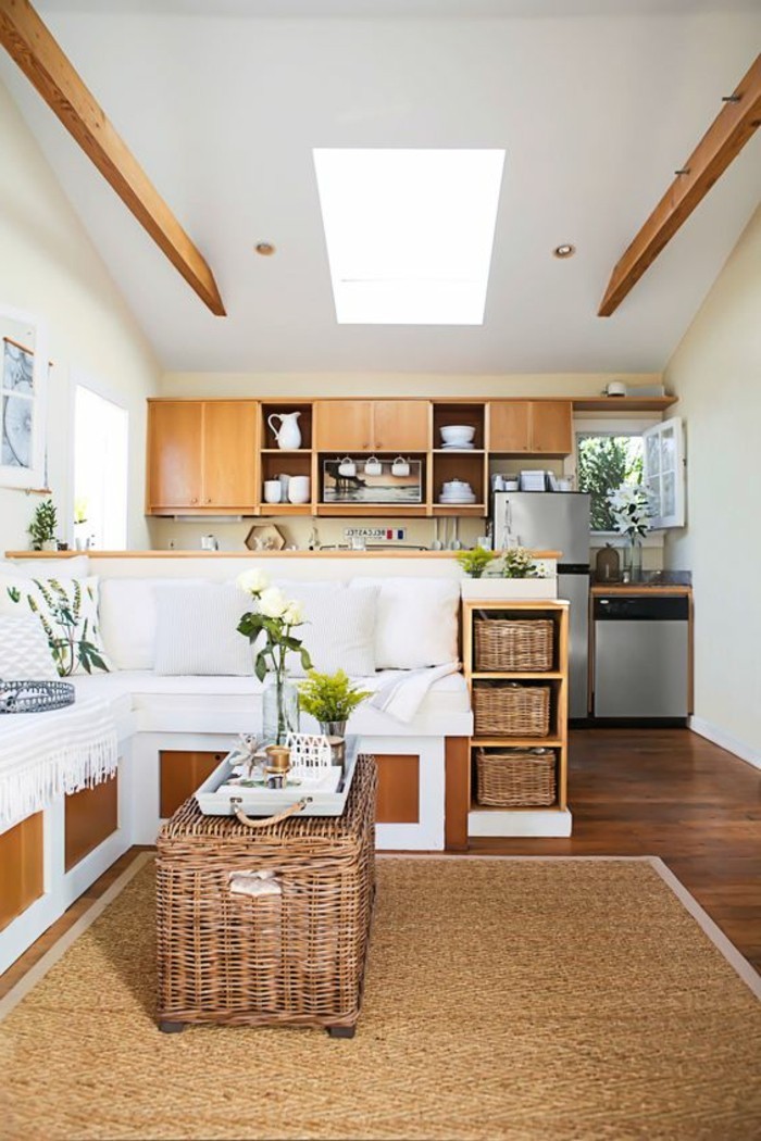 wicker furniture details, and wooden cabinets, inside a room with a kitchenette, and a living room area, home decor inspiration, brown and white palette