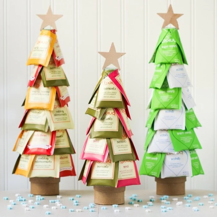 creative gift ideas, three christmas trees, made from tea packets, and decorated with stars