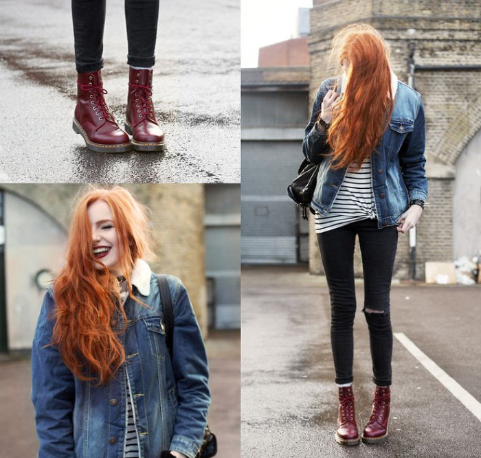 wavy long copper red hair, on slim girl, wearing black ripped skinny jeans, retro denim jacket, and oxblood dr. martens