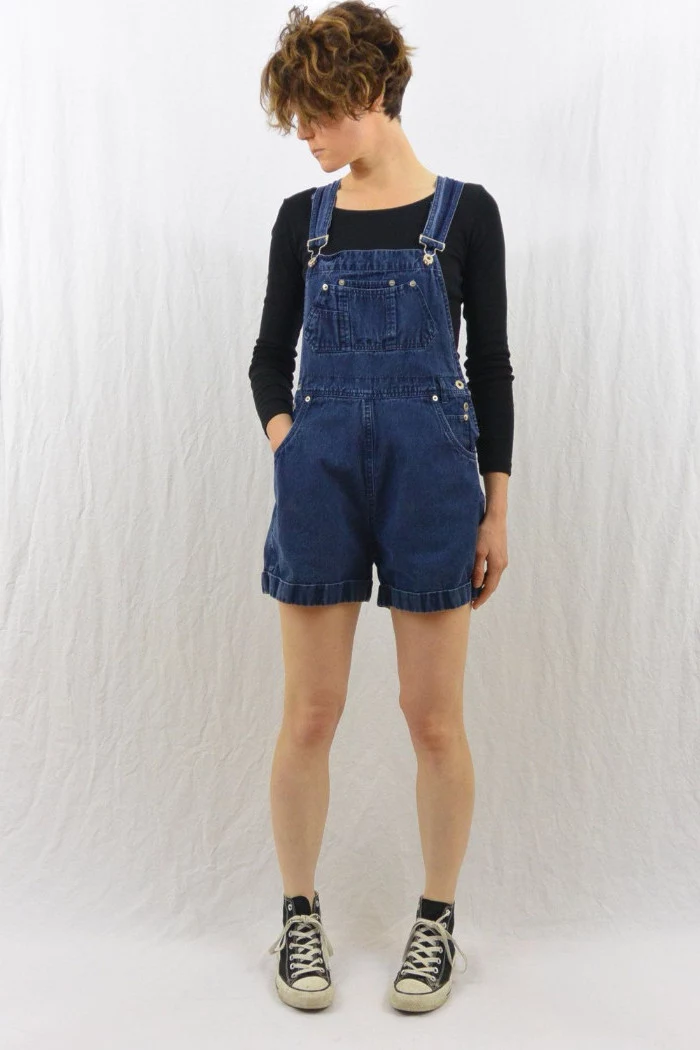 inky blue denim, retro 90s overalls, worn with vintage converse sneakers, and a black jumper