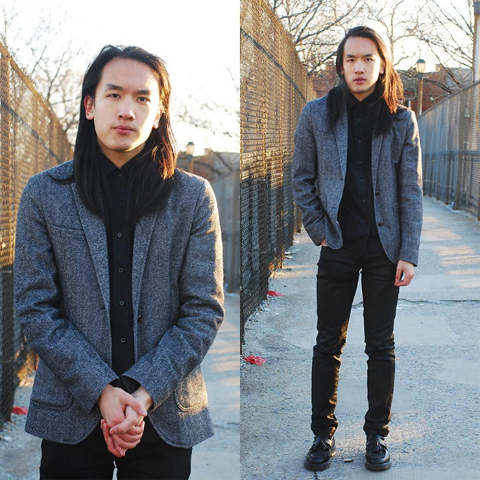 shoulder-length dark hair, on an east asian man, wearing a black shirt, black trousers and a vintage grey blazer, 90s clothes mens