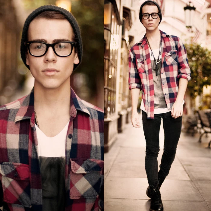 hipster outfit with flannel shirt, unbuttoned to reveal a white t-shirt, with grey print, 90s party outfits for guys, dark grey skinny jeans, beanie hat and glasses