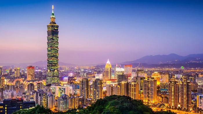 multicolored evening landscape, showing the city of taipei, postmodern design, a very tall skyscraper, taipei 101 to the left