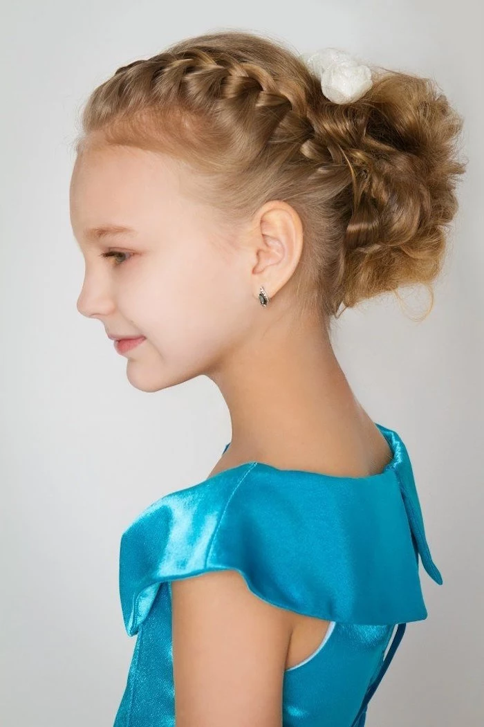 pale young girl, in a smart, shiny teal dress, with dark blonde hair, woven into a side-braid, little girl haircuts, a messy curled bun at the back