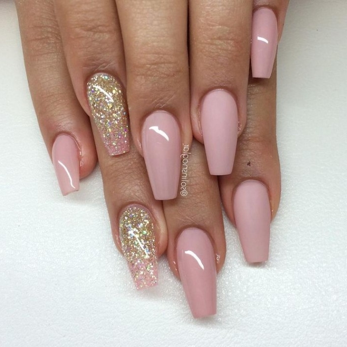 smooth and glossy pink nail polish, on a ballerina-style manicure, decorated with gold, and rose gold glitter, nude nails with glitter, on two hands