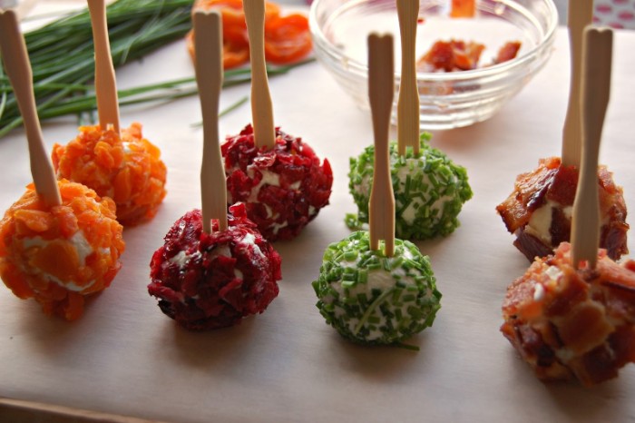 horderves ideas, eight cheese balls, with different toppings, dried apricot pieces, bacon and chives, red onion chutney
