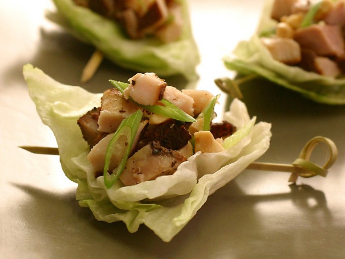 chinese inspired horderves ideas, stuffed cabbage leaf, with stir fried pork, and spring onions