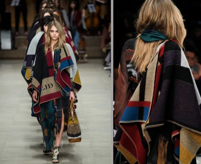 catwalk models helmed by cara delevigne, dressed in layered clothing, with oversized scarves in block colors, ways to wear a blanket scarf, in a fashionable way