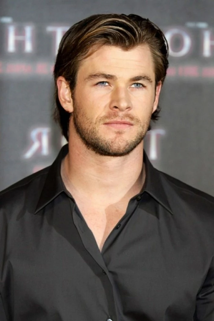 smart black shirt, worn by chris hemsworth, with brunette hair, side parted and bangs swept to one side, trendy haircuts for men, worn by hollywood stars