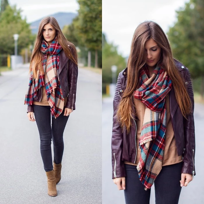 how to tie a blanket scarf, demonstrated by a slim brunette woman, wearing dark skinny trousers, and a brown leather biker jacket, seen from two angles