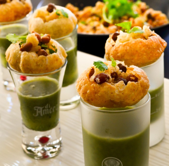 hor d oeuvres ideas, fish cakes with red beans and parsley, topping shot glasses, filled with green dip