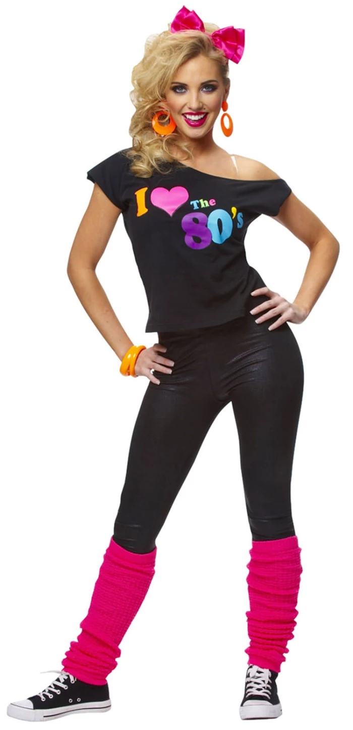 hot pink leg-warmers, worn over leather-like black leggings, and an off-the-shoulder black top, with a colorful print, 80s halloween costumes, large orange earrigns, and a pink hair bow