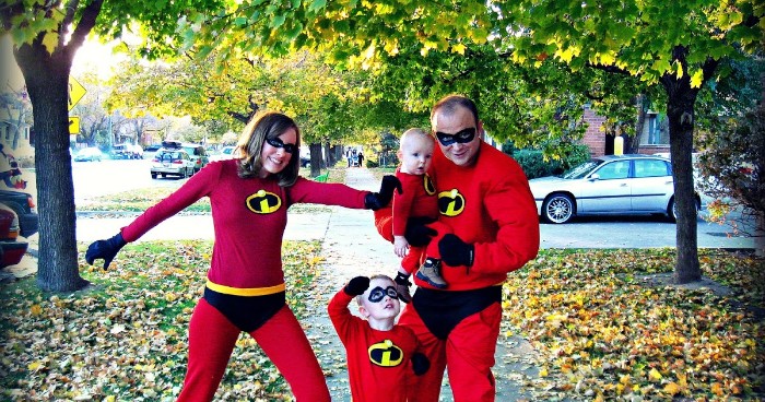 mother and father, and two small children, dressed like the superheroes, from disney pixar's the incredibles, family halloween costumes