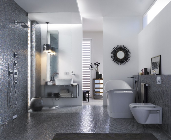 spa like bathrooms, grey mosaic tiles, covering the floor, and part of the walls, open-space shower area, a white tub, and a toilet seat