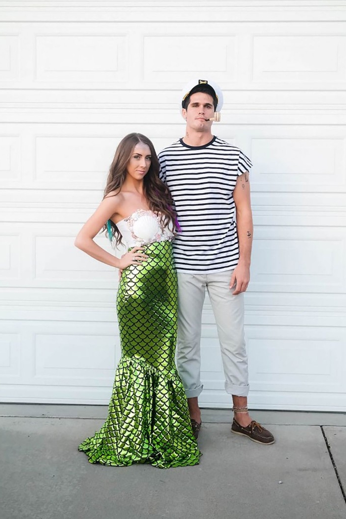 striped black and white t-shirt, off-white ankle pants, loafers and a captain's hat, on a man with a pipe, standing next to a woman, dressed as a mermaid, cute couple halloween costumes, mermaid and captain