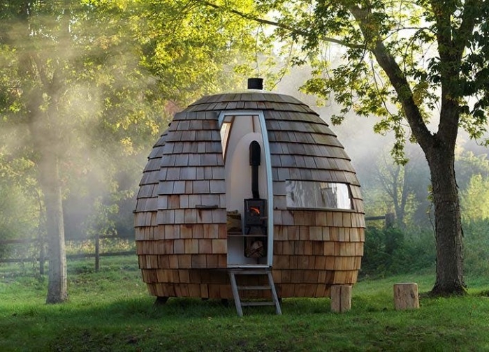 pod-like oval she shed, with a small window and a narrow door, opened to reveal a heater inside