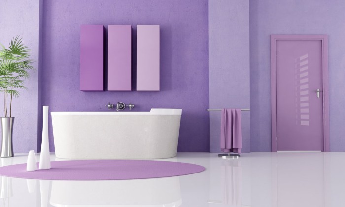 lavender colored room, with glossy smooth white floor, best paint for bathrooms, featuring a white tub, and a round purple rug