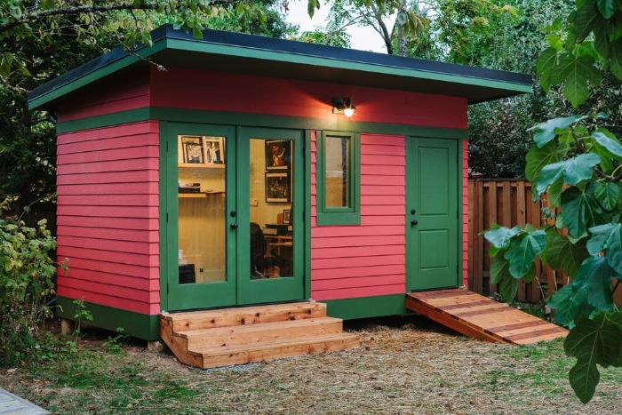 pink and green shed, resembling a watermelon, garden shed ideas, two doors with small stairs and a ramp