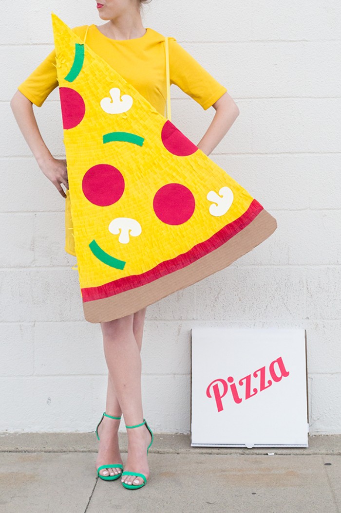 yellow mini dress, and a giant pizza slice, made from carboard and paper, couples halloween costume ideas, delivery guy and pizza