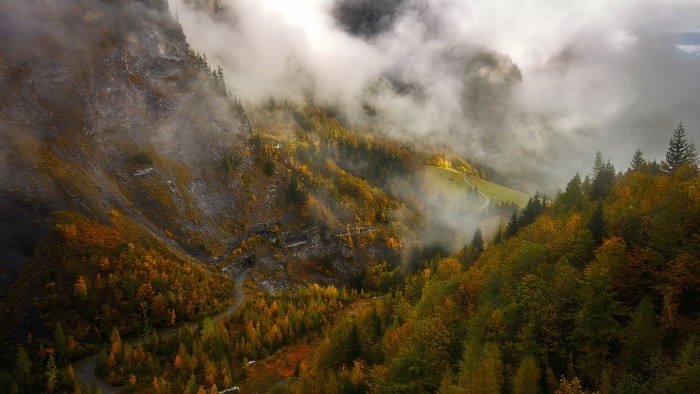 thanksgiving text messages with images, white mist partially covering a mountinous region, seen from above, fall trees with leaves in many colors