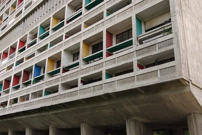 multicolored balconies on a grey concrete building, le corbusier's unité d'habitation, in marsille france