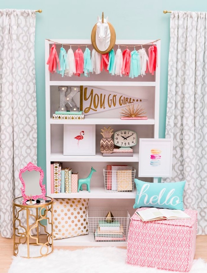 baby blue wall, with patterned curtains in white, and pale grey, teenage girl room ideas, white cupboard with five shelves, filled with books and various, pastel colored items