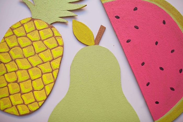 diys for your room, close up on four bulletin boards, made from painted cork, and shaped like fruit, pineaple and a pear, slice of watermelon