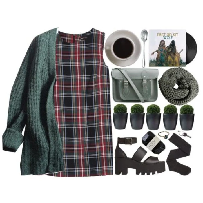 sleeveless plaid mini dress, in black and red, dark green and white, chunky heeled black sandal, fir green chunky knit oversized cardigan, 90s grunge clothing, black socks a grey tube scarf, a cross-body bag, and various accessories