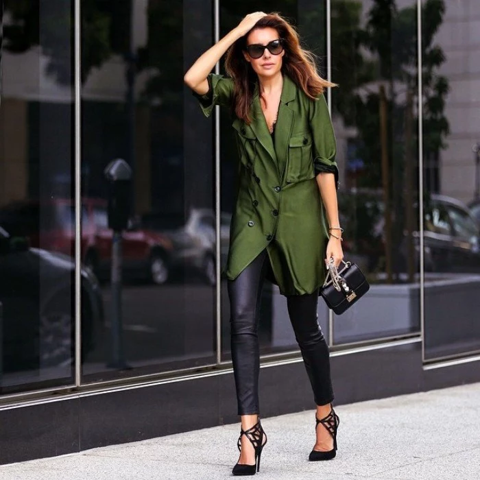 forest green oversized shirt, with rolled up sleeves, worn over black, leather look leggings, thanksgiving outfits, black high heels