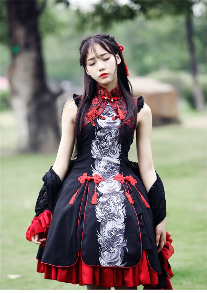 chinese inspired gothic lolita, in a black sleeveless dress, with grey and white dragon print, and red details