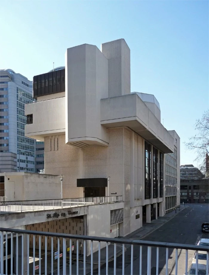 white multi-storey building, made up of rectangular segments, and featuring windows, covered in dark glass, salters hall in london england