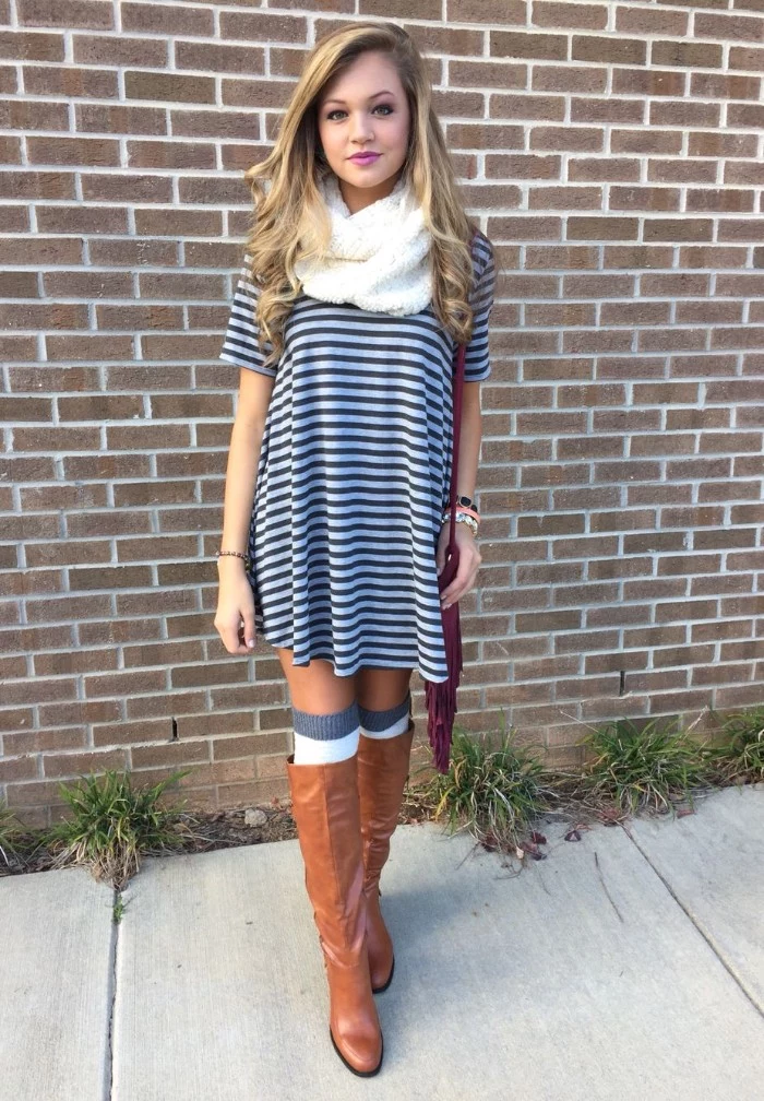 comfy outfits, striped black and white t-shirt dress, worn by a slim, young blonde girl, with tall brown leather boots, and white and grey over-the-knee socks