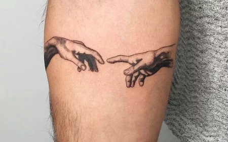 small tattoos for men the creation tattoo