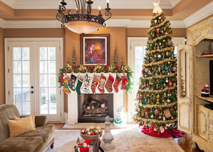 nine multicolored stockings, hanging on a white mantelpiece, decorated with a green garland, featuring gold and red ornaments, fireplace decor, a tall christmas tree, lavishly adorned standing nearby