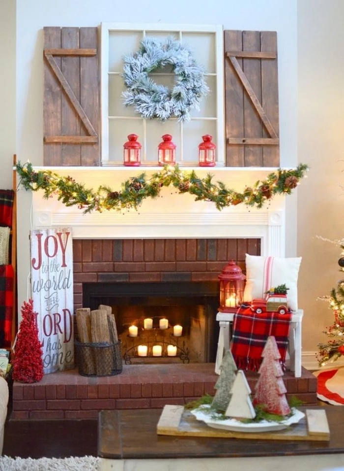 diy fireplace mantel decor, featuring a faux window, with wooden blinds, a white wreath, and a garland with fairy lights
