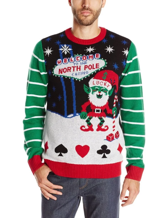 playing card synbols, and an elf dressed in a red suit, on a jumper inspired by las vegas, worn by a slim man, ugly sweater party, welcome to the north pole casino, written in red and blue
