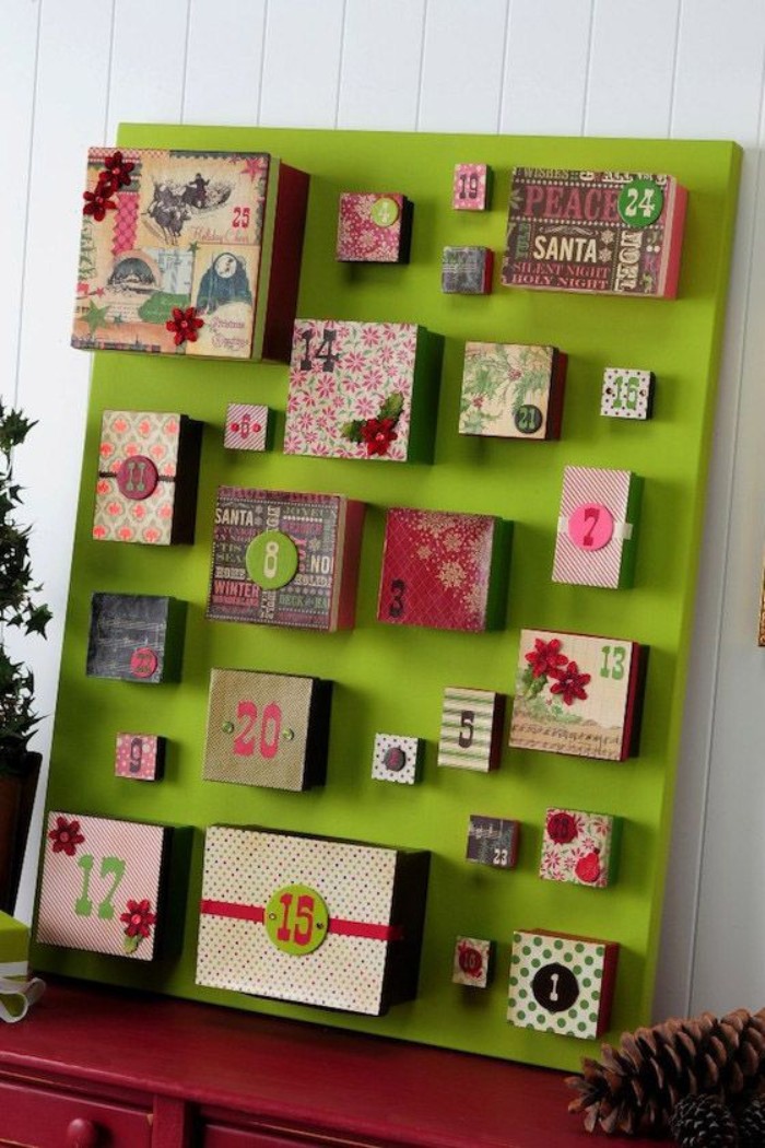 acid green board, featuring numbered colorful, advent calendar boxes, in different shapes and sizes, decorated with paper decoupage